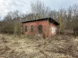 Voormalig DB-station met B&B-potentie en bedrijfsruimte van ca. 680 m² op 1,2 ha perceel in Grambow - Duitsland