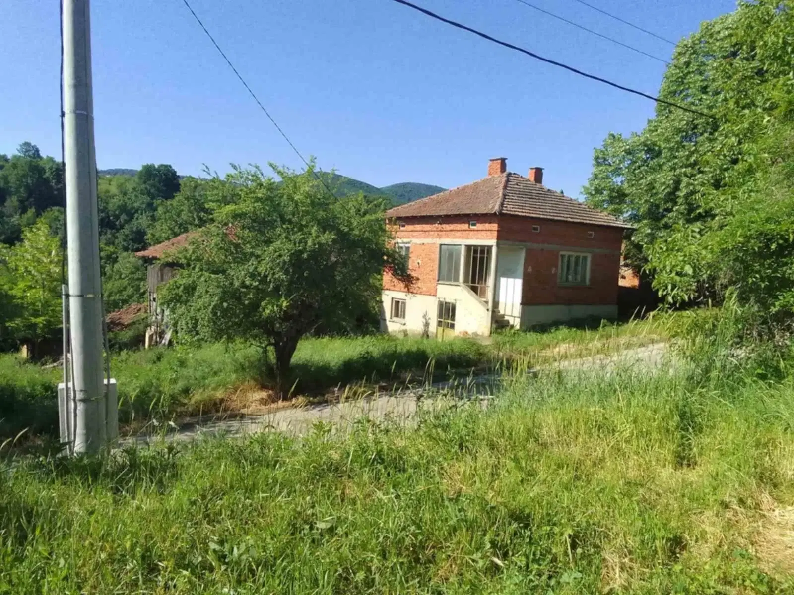 Eigendom aan de rivier met 2 huizen, bijgebouw en 1.100 m² grond in Podgore, Vidin - Bulgarije