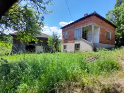 Eigendom aan de rivier met 2 huizen, bijgebouw en 1.100 m² grond in Podgore, Vidin - Bulgarije