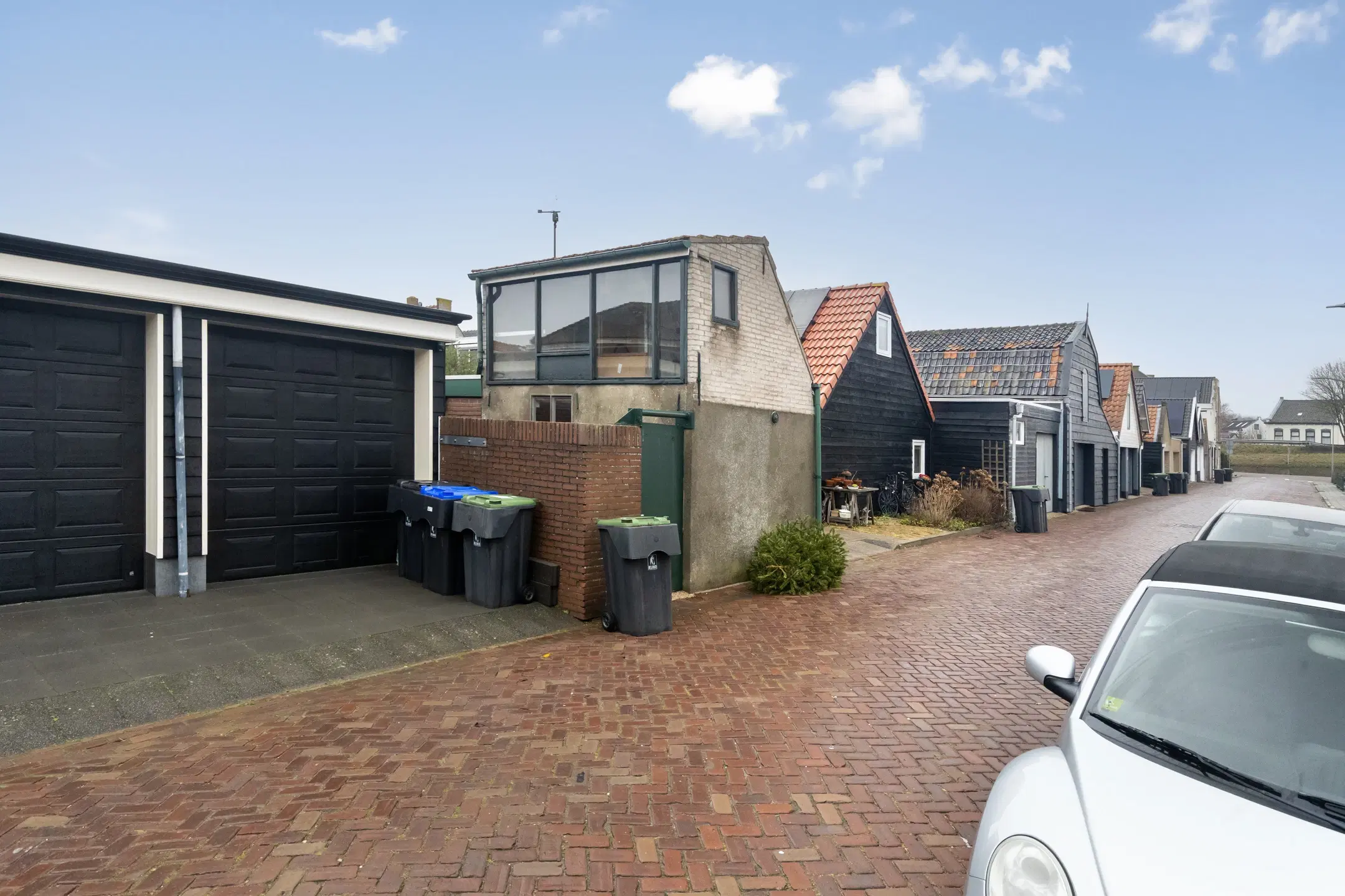 Stellendam, Voorstraat 9 en Mr. Iman Caustraat 6 